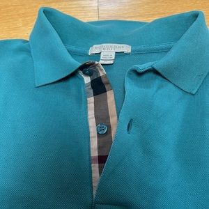 Burberry Polo small size. Dry cleaned.